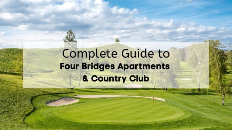 A view of golf course surrounded by trees with the text “complete guide to four bridges apartments and country club”